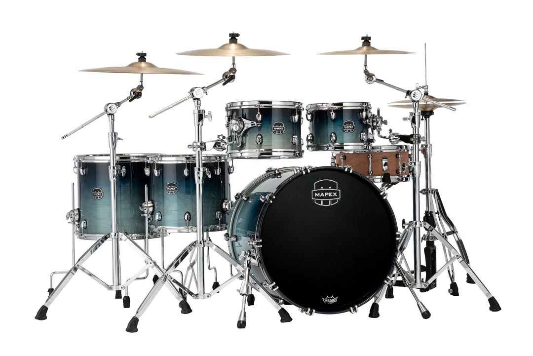 The New Mapex Nodal line Air Flow Venting scheme gives Saturn superior feel and just the right amount of renonance.  Whether tuning up high for jazz and fusion or down deep for rock-n-roll, the he unique Maple and Walnut shell composition complete with SONIClear bearing edges results in clear and focused toms and a bass drum that sounds bigger than it should. 

22 in. x18 in.  Bass Drum (No Mount), 10 in. x7 in.  & 12 in. x8 in.  Toms 14 in. x  12 in. , 16 in. x14 in.  Floor Tom  with Static 90degreeFloor Tom Legs (x6), MSSTC1 (x2)