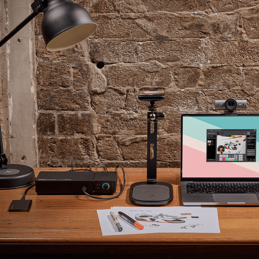 Creator live streaming with a RØDECaster Video Core desk setup